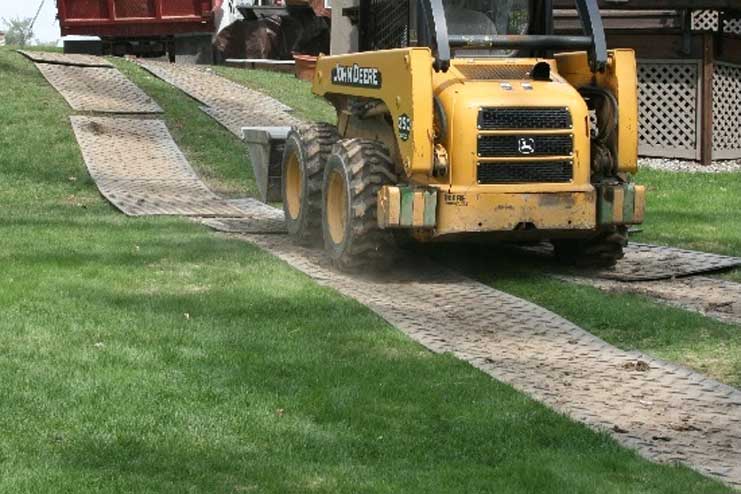 Yellow digger on rhintough mats